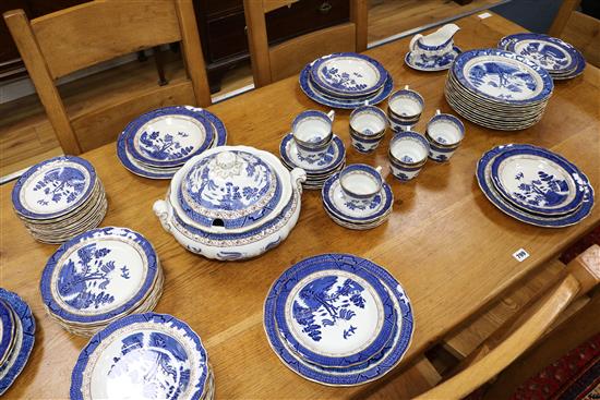 An Old Willow pattern Doulton dinner service